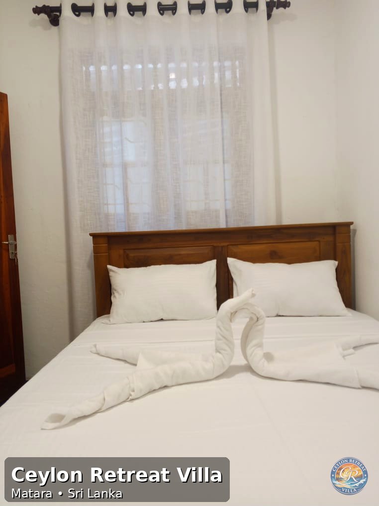 Double room with fresh linen and towel swan at Ceylon Retreat Villa